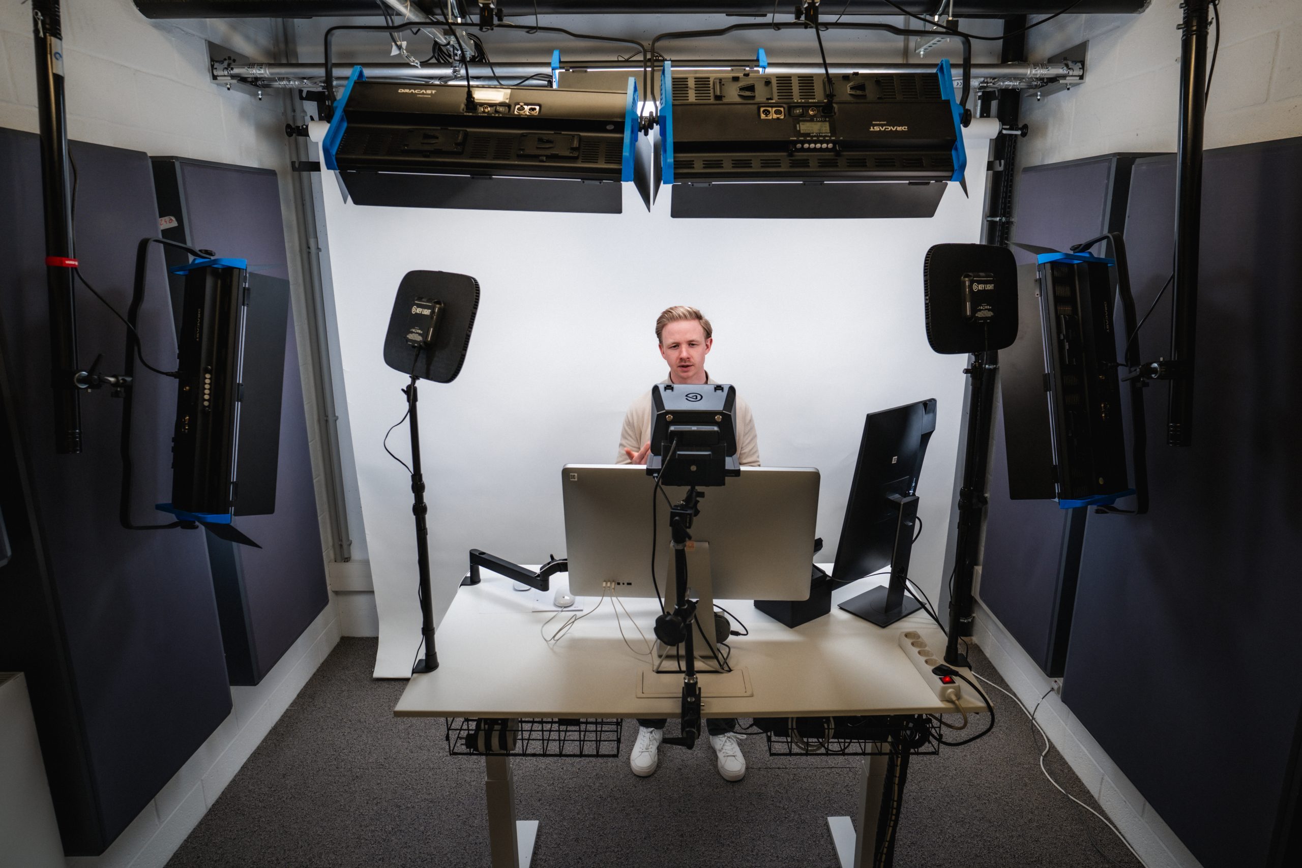 Person in front of a self recording camera set