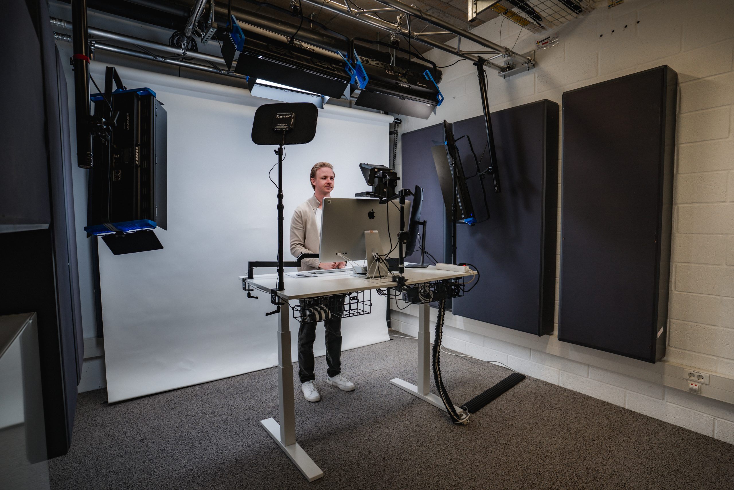 Man standing behind a self recording studio
