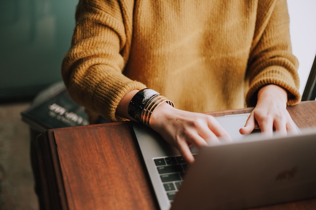 Career Centre, cover image. Person using a laptop