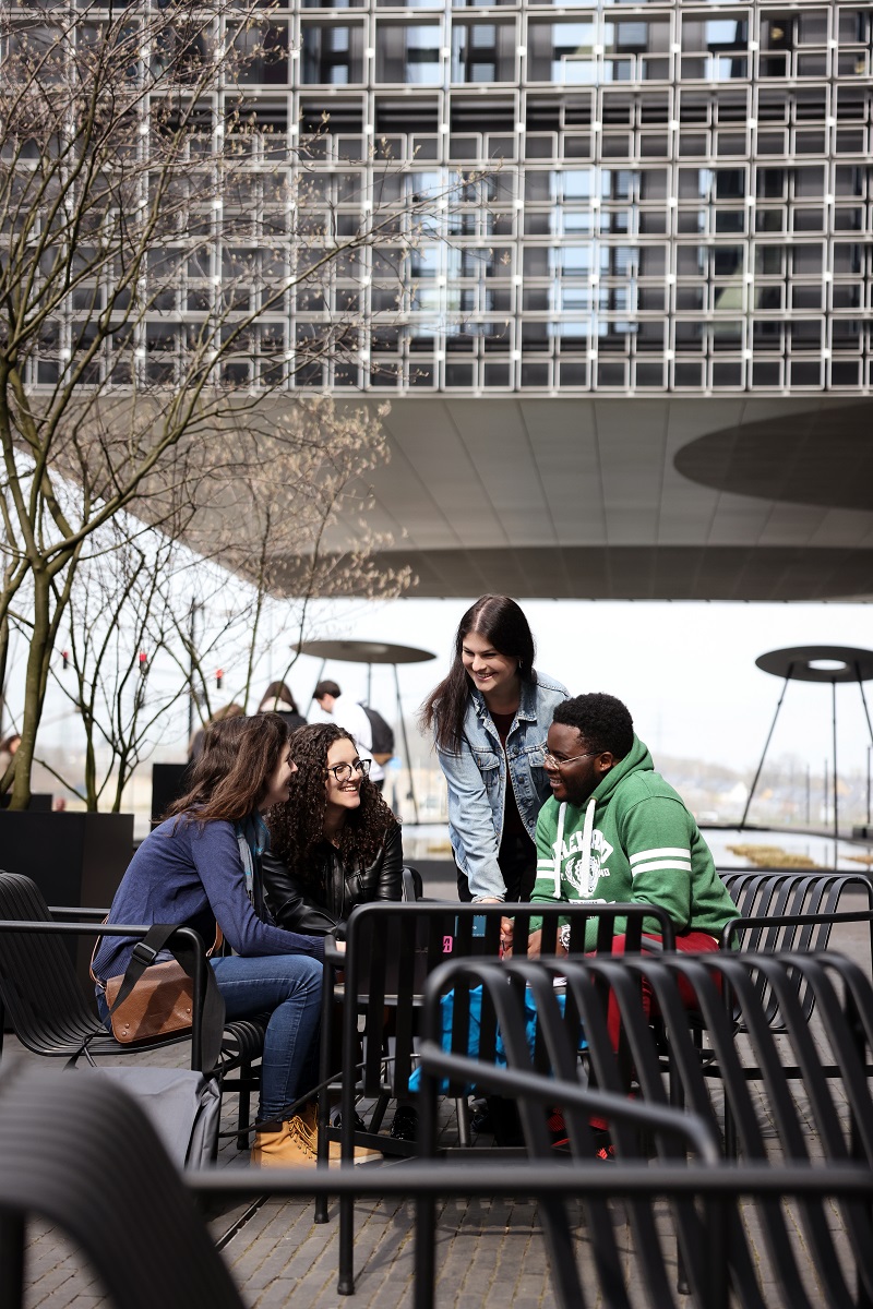 students chatting on campus.