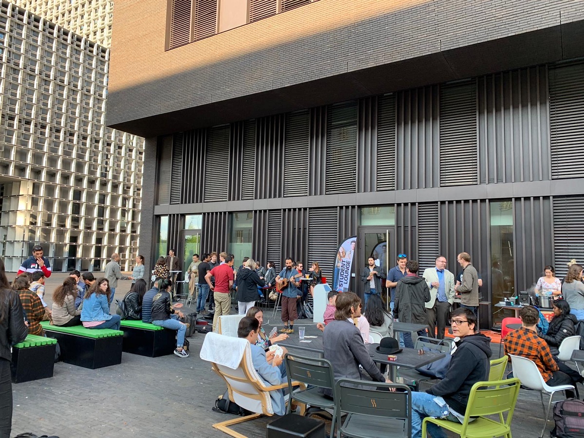 Outdoor view of the Student Lounge in Belval, full of students.