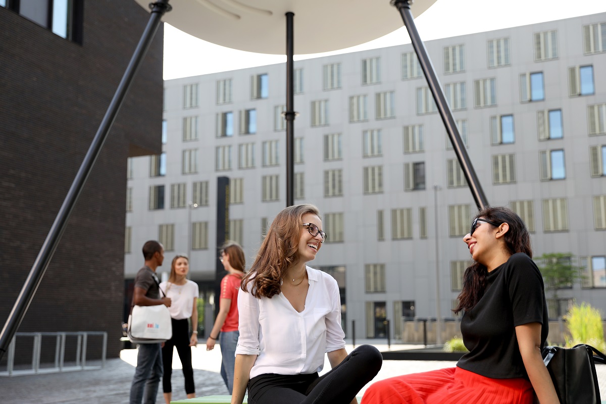 Two girls chatting on Belval Campus