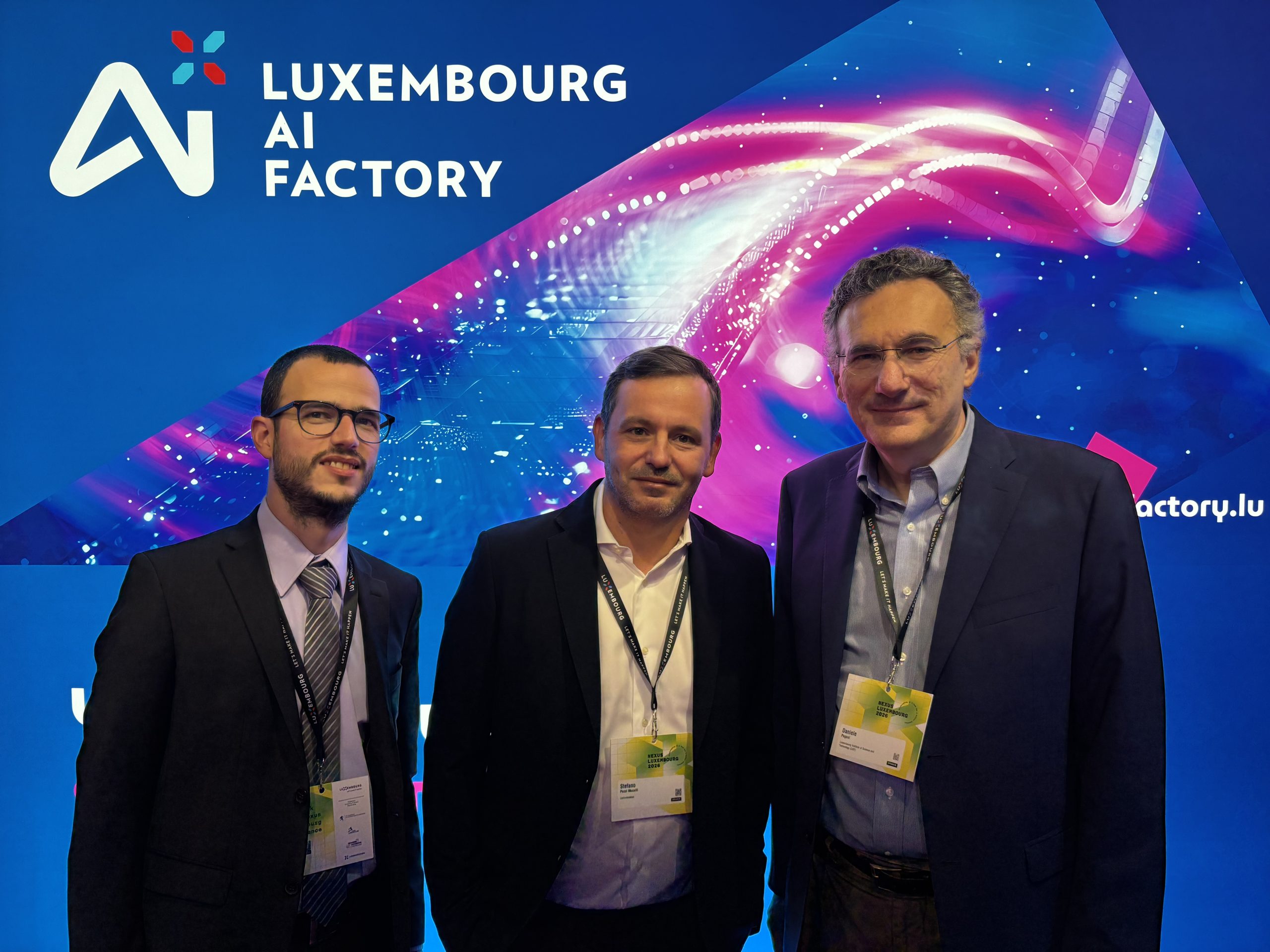 Photo of Maxime Cordy, Stefano Pozzi Mucelli, and Daniele PAGANI, with Luxembourg AI Factory Logo behind.