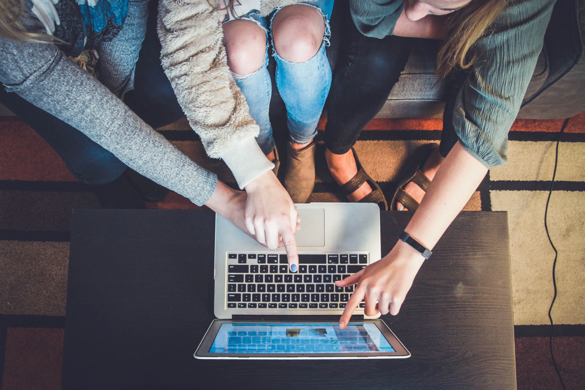 Young people on a laptop screen