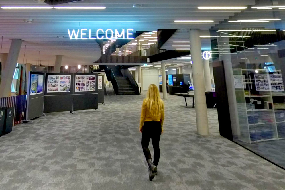 Girl walking through the Luxembourg Learning Centre