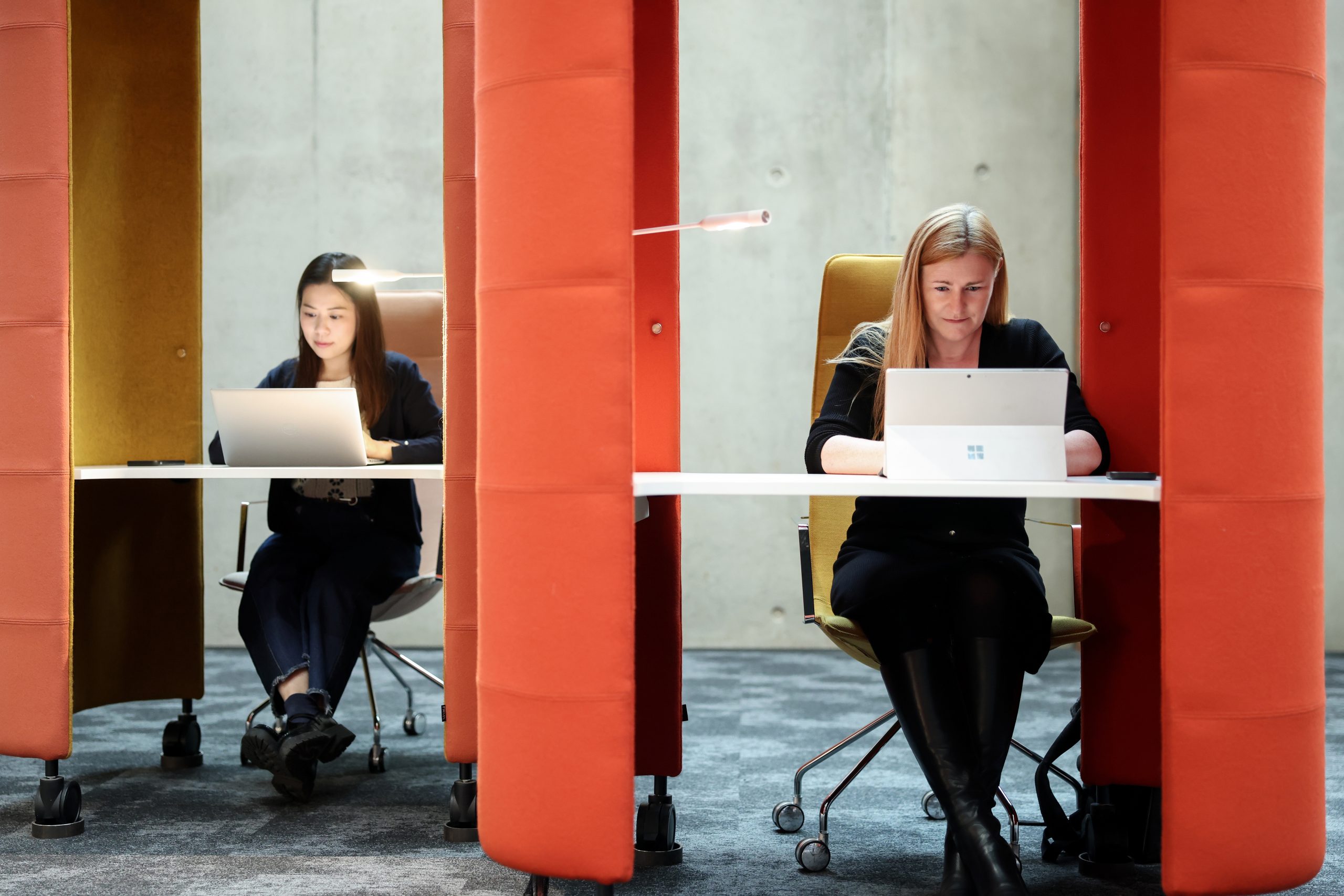 Twi girls studying at the LLC library booths